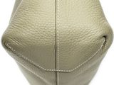 a close up of the inside of a white leather purse