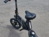a scooter that is sitting on the pavement