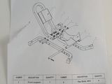 diagram of a motorcycle wheel chock on a piece of paper