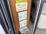 a close up of a door with a bunch of buttons on it