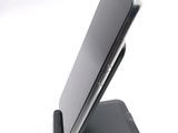 a cell phone that is sitting on top of a stand