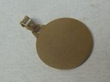 an image of a gold plated pendant with a diamond in the center