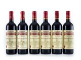 six bottles of red wine lined up in a row