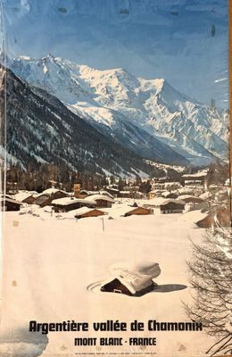 a book with a picture of a snowy mountain in the background