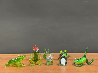 many figurines that are sitting on a table