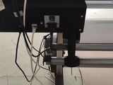 an image of a machine that is working on a piece of paper
