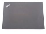 a laptop that is sitting on a white surface