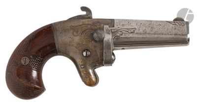 an old gun with a wooden handle on a white background