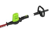 a green and black corded hedger with a green handle