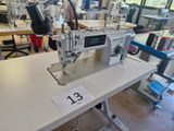 a sewing machine that is sitting on a table
