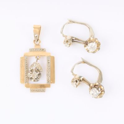 three pieces of jewelry including a pendant, earrings, and a ring