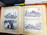 a book with pictures of people and buildings on it
