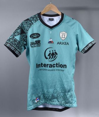 a blue jersey with a black and white design on it