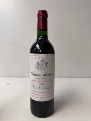 a bottle of wine that is sitting on a table