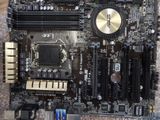 a close up of a computer mother board with many components on it