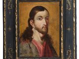 a painting of a man with a beard in a frame