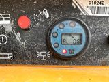 a close up of a control panel on a construction vehicle
