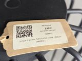 a tag that is attached to a wire basket