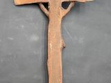 an old wooden cross on a black background with a black background
