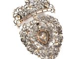 an image of a brooch with a heart and a crown on it