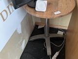 a small table with a tv on top of it