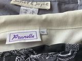 several different types of clothing are on display in a store