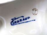 a close up of a porcelain figurine of a horse