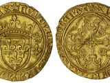 une pièce d'or ornée d'une couronne et d'un bouclier