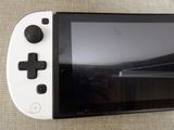 a close up of a video game controller on a table