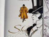 a book with a drawing of a man in a top hat