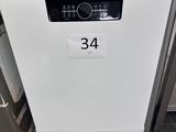 a dishwasher with a number on it in a kitchen