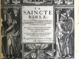 une image en noir et blanc représentant un livre sur lequel figure l'illustration d'un homme et d'une femme