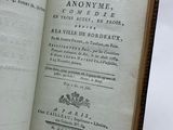 an open book that is sitting on a table