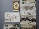many old photos of a man on the wall