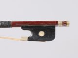 a violin bow with a bow rest attached to it