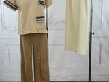 a mannequin and pants on a stand in a room