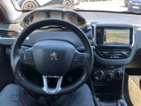 the interior of a car with a steering wheel and a dash board