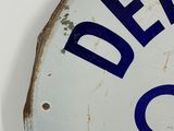 a white and blue sign that says delta oil on it