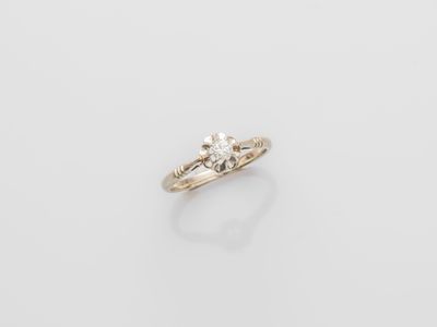 an 18k yellow gold diamond ring