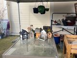 a table with a glass top under a tent