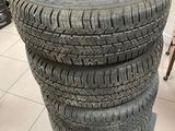 tires stacked on top of each other in a store