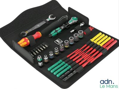 an image of a tool kit in a black case on a white background