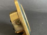 gold plated brass clock with a green marble dial