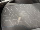 a picture of a car seat with a hole in it