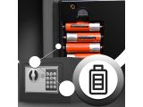 an image of a safe box with batteries in it and a key lock