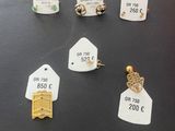 a lot of jewelry on display on the table