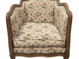 an image of a chair with a floral upholstered back