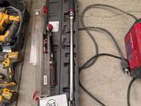 a lot of tools that are sitting on the floor