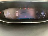 the dashboard of a car with a digital display on it
