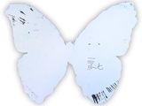 a picture of a white butterfly cut out of paper